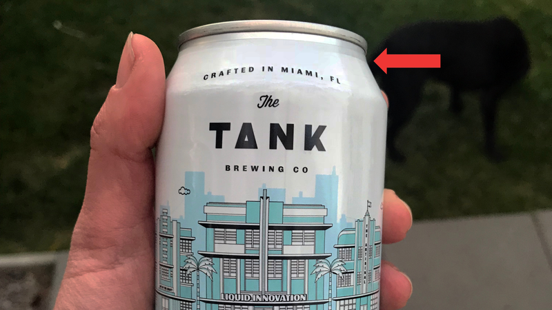 You can see the sleeve’s gap between the label and the lip of the can. (And say hi to my dog in the background.)